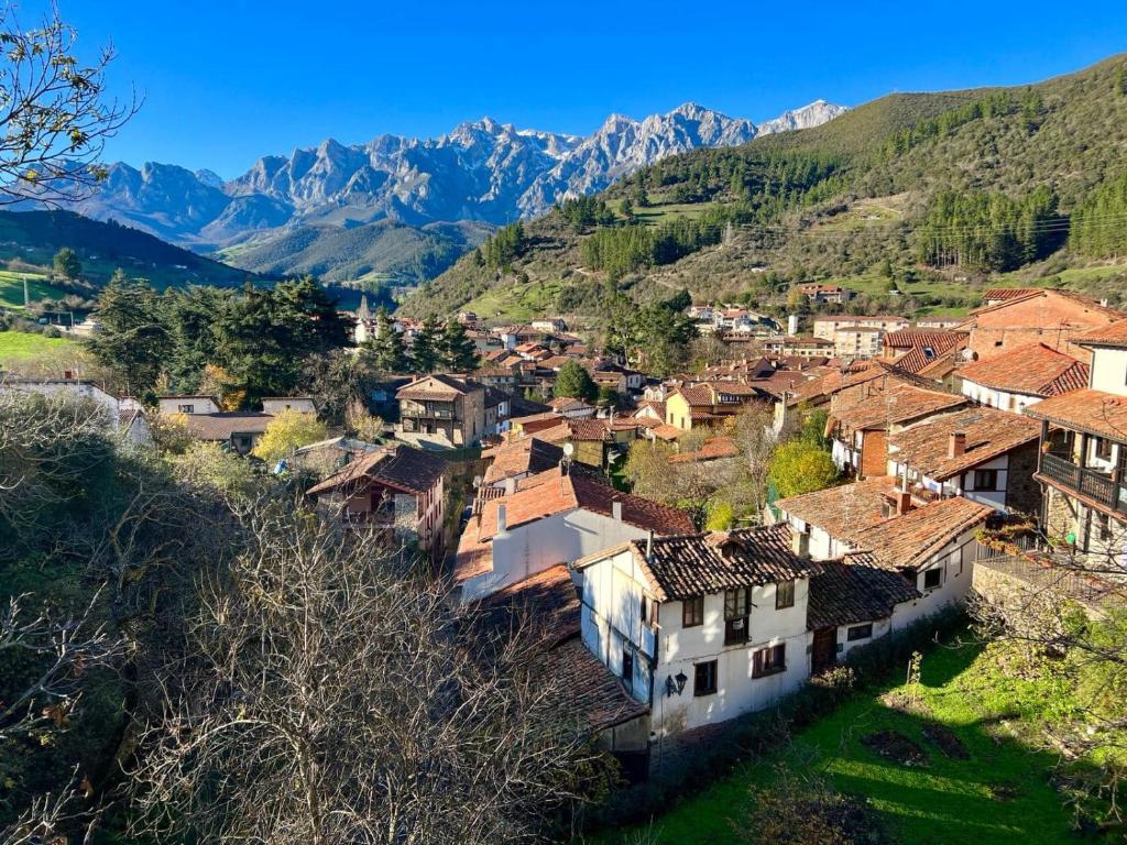 A street in the village of Cosgaya between stone houses